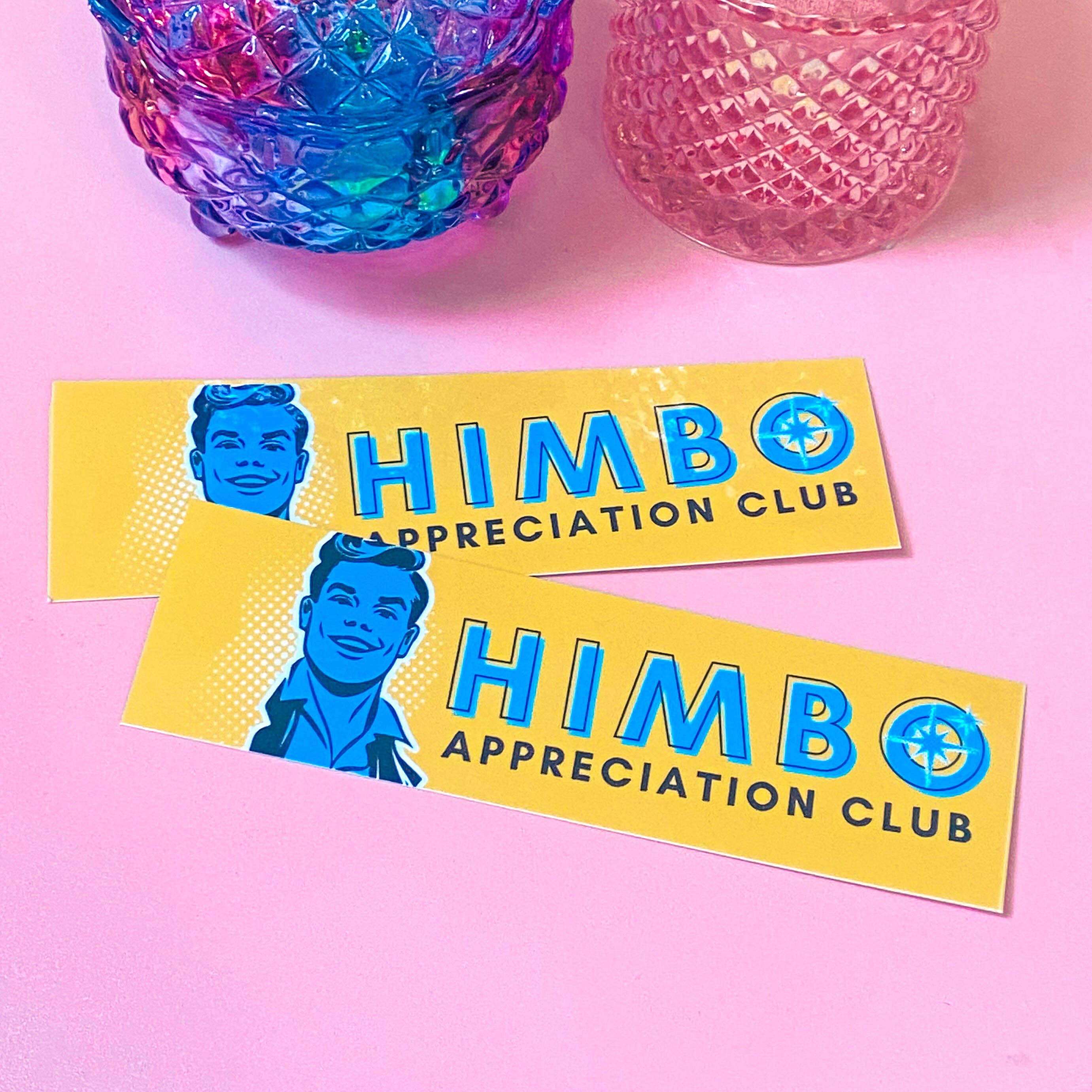 Two 'HIMBO Appreciation Club' stickers on a pink background with colorful glass containers.